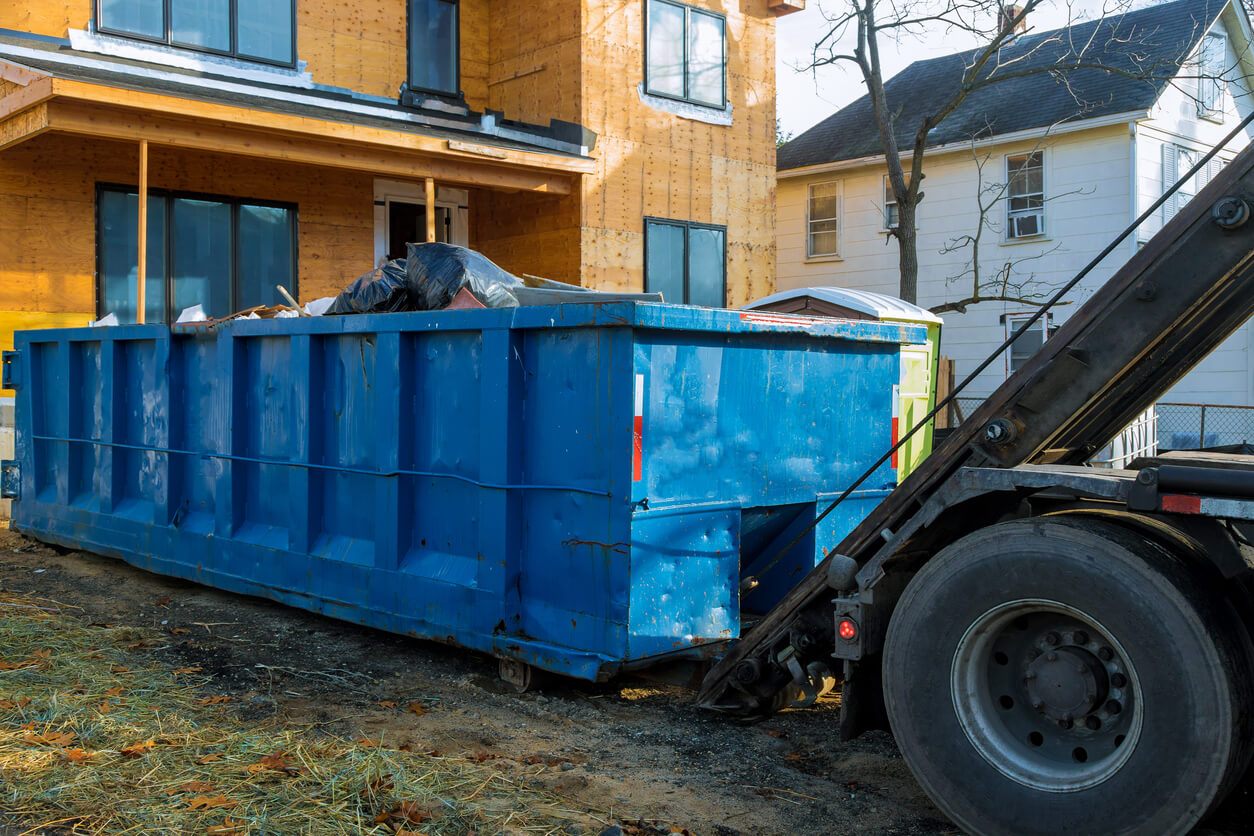 Recycling container trash dumpsters being full with garbage